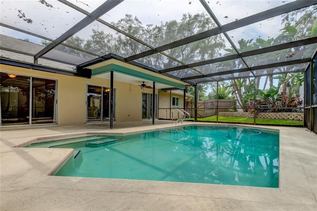 Gorgeous Fun Inground Pool w/ Covered, Screened in Lanai w/Plenty of Covered Areas in the Shade.. w/ Ceiling Fans! You Will LOVE!