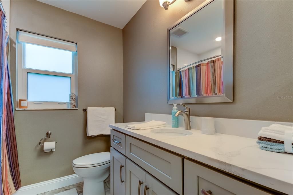 Hallbath (7.6 x 7') is FULLY UPDATED w Tasteful / Congruent Style Choices to Compliment the Kitchen Renovation!