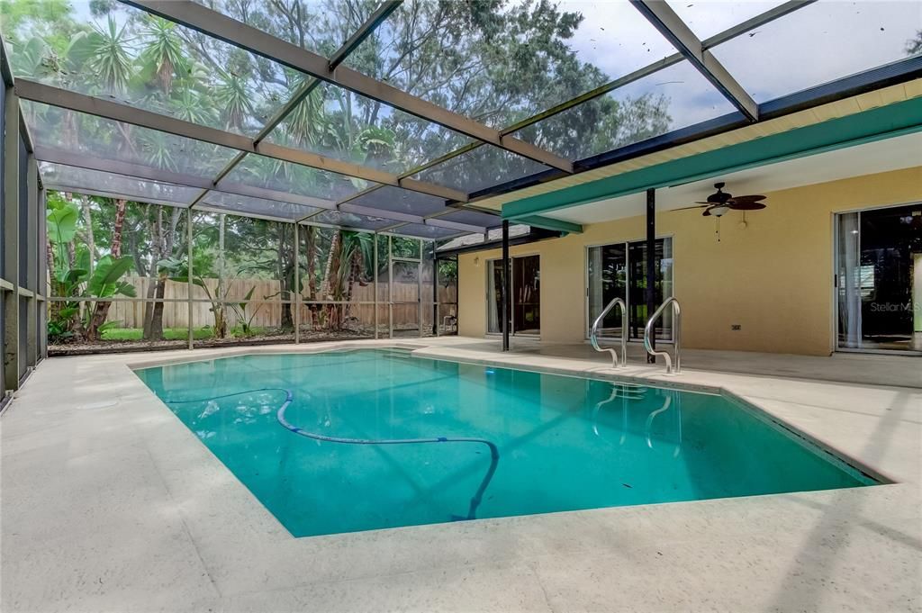 Gorgeous Fun Inground Pool w/ Covered, Screened in Lanai w/Plenty of Covered Areas in the Shade.. w/ Ceiling Fans! You Will LOVE!