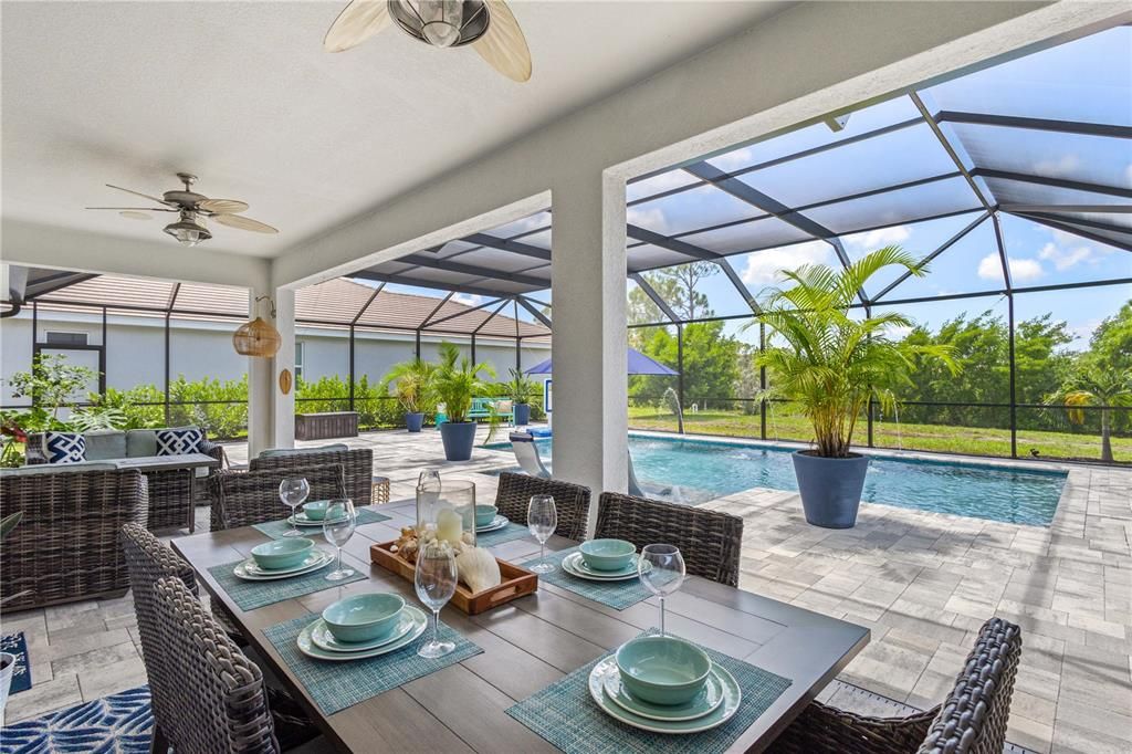 Large shaded retreat of the lanai with dual fans