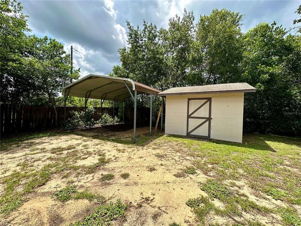 Metal Carport and CB Shed