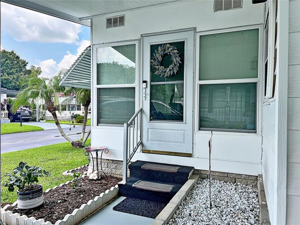 Entry onto enclosed front porch