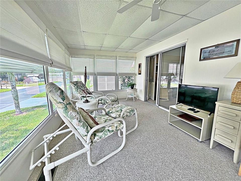 Front enclosed porch with blinds