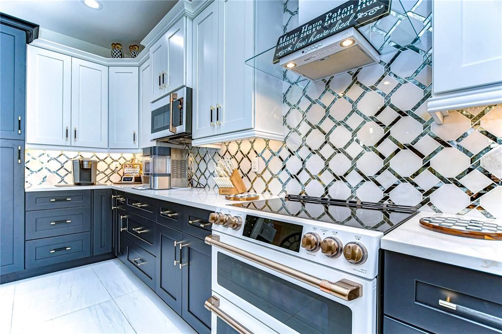 Stunning glass and marble backsplash!