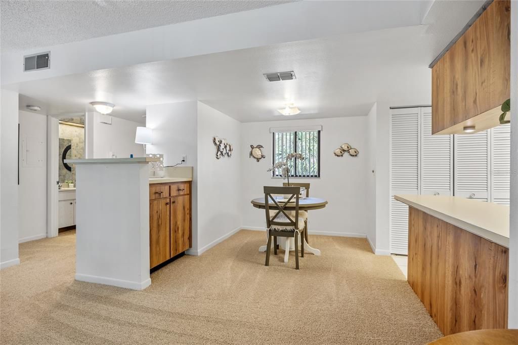 This charming dining area has a convenient Dry Bar.