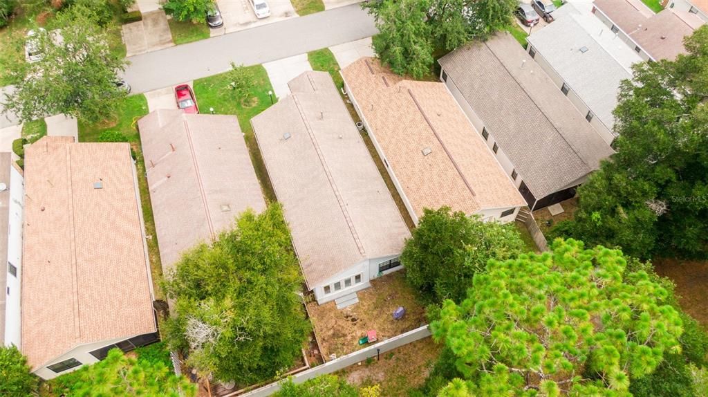 Aerial (center home/fenced backyard)