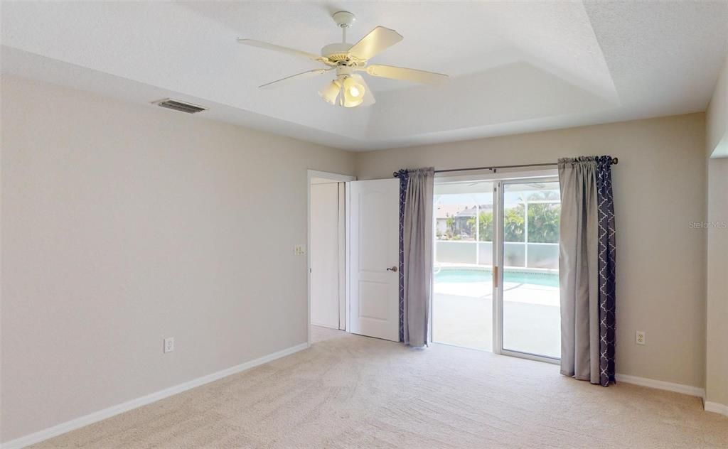 Sliding glass door out to pool.