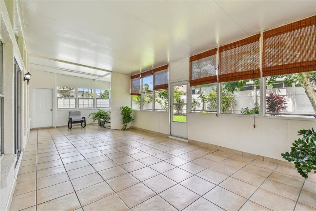 Sunroom with tile flooring