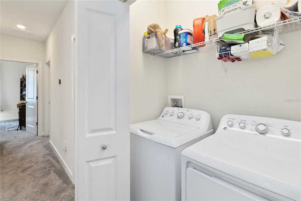 Inside Closet Laundry Room washer & dryer stays.