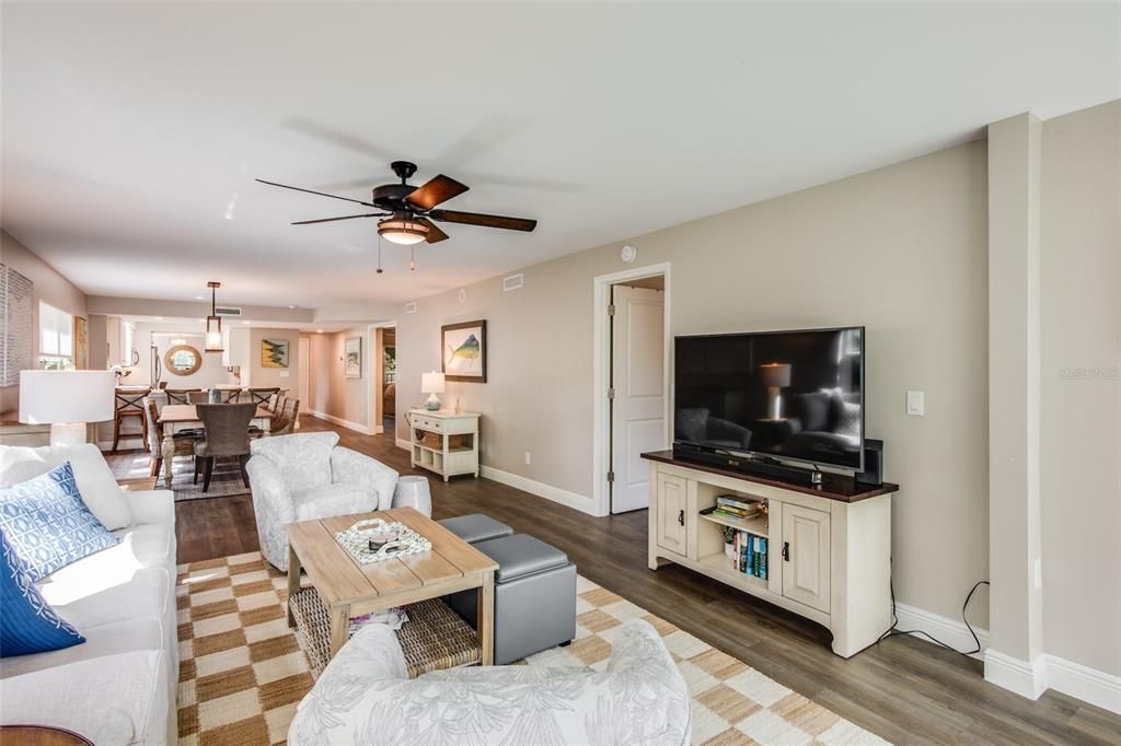 Ceiling fans and neutral lighting throughout the condo