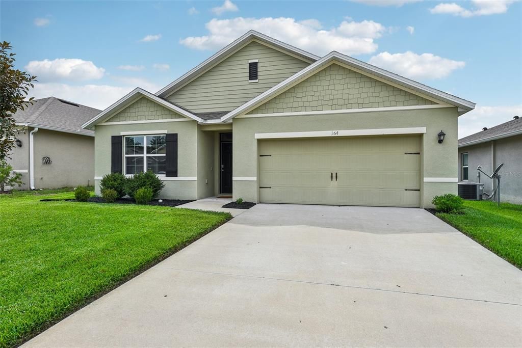 Away from the hustle and bustle of Orlando, perfectly situated in Debary’s Springview Woods, you will find this beautiful 2018 built 4-bedroom, 2-bath home featuring a bright and modern OPEN CONCEPT kitchen, living and dining with a SCREENED LANAI and FULLY FENCED BACKYARD!