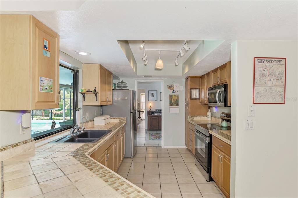 Large galley style kitchen with plenty of counter space