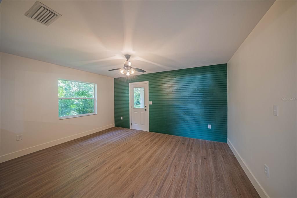 Dining area w/door to back porch.