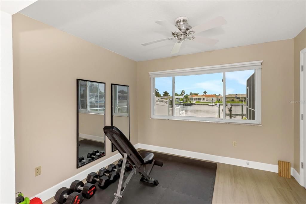 Primary suite's Den, Office or Gym provides a fantastic view!