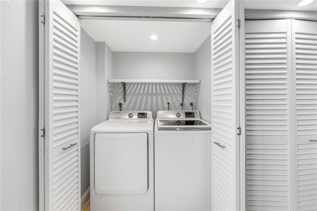 Full size side by side washer and dryer in kitchen