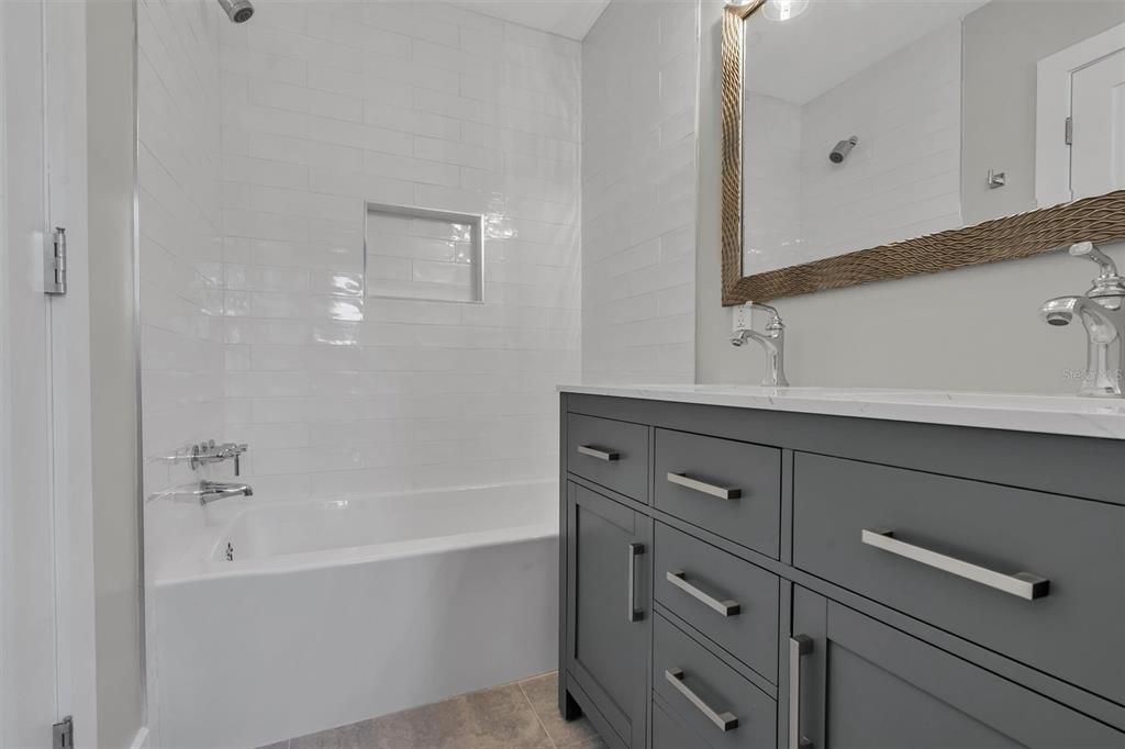 Hall bath for guest suites