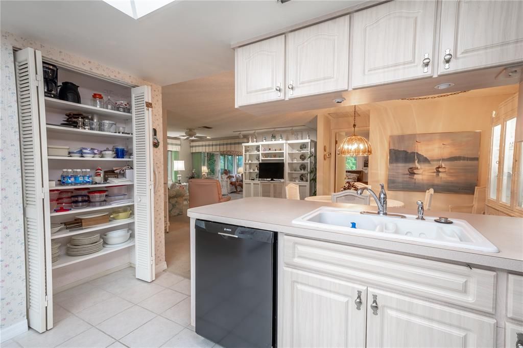 The kitchen features a large closet pantry.