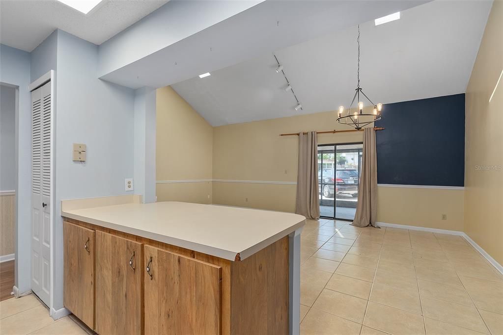 view from kitchen into dining into family room