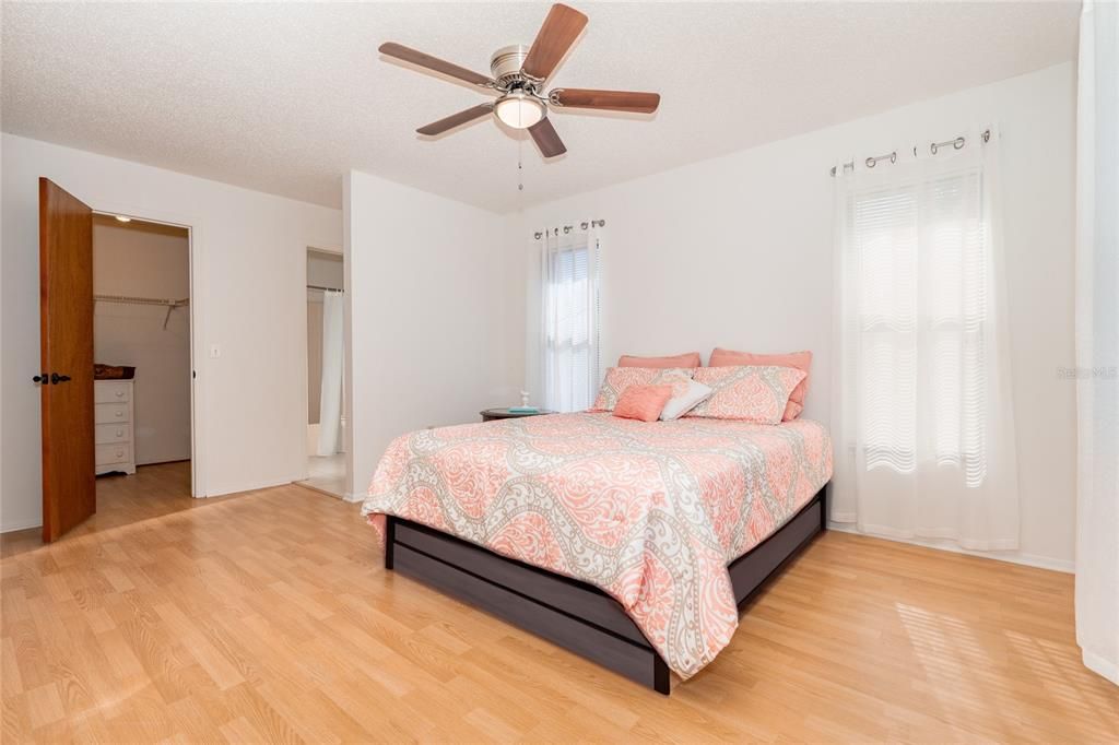 Walk-in closet in primary bedroom