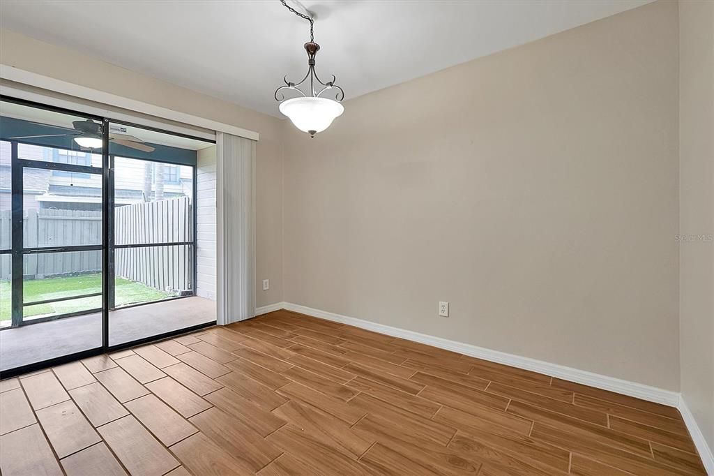 This is the dining area off the kitchen.  The center island work station is just to the left of this area.