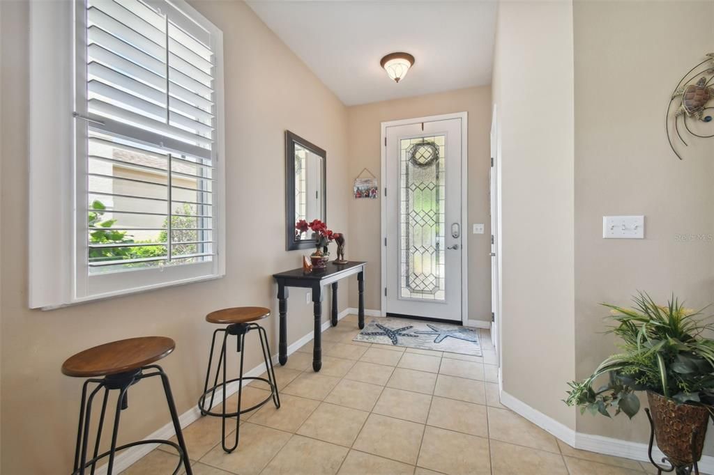 FOYER ENTRY with a coat closet