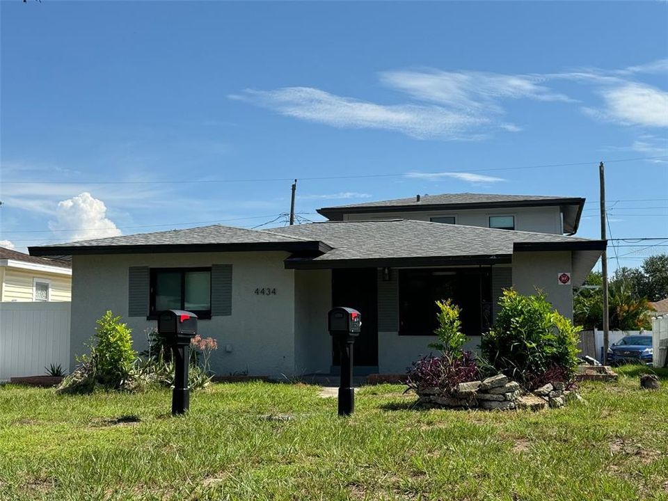 Front of property view from 9th Avenue. Garage apartment in back...