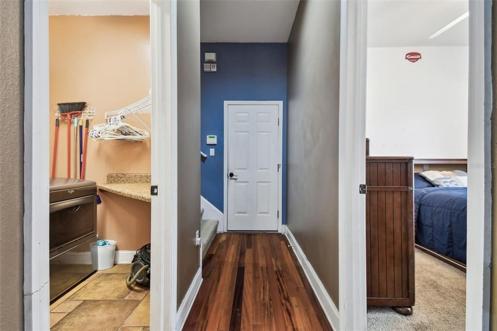 Hallway towards bonus room and garage