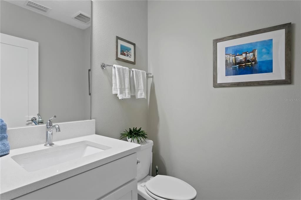 Half bath off main living for convenient entertaining