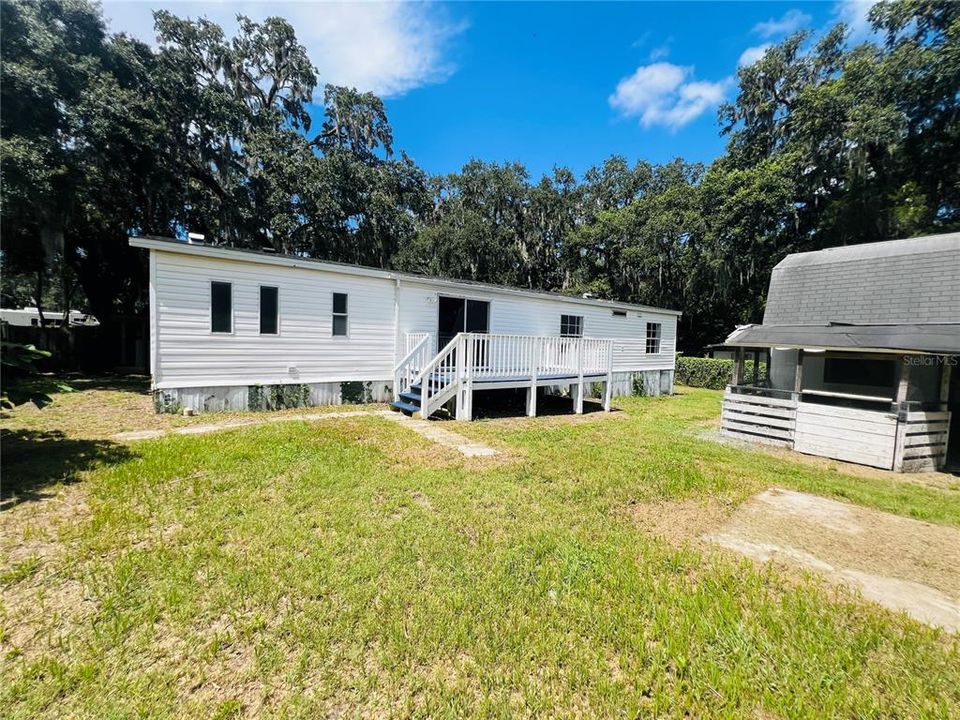 VIEW OF BACK OF HOUSE AND DECK