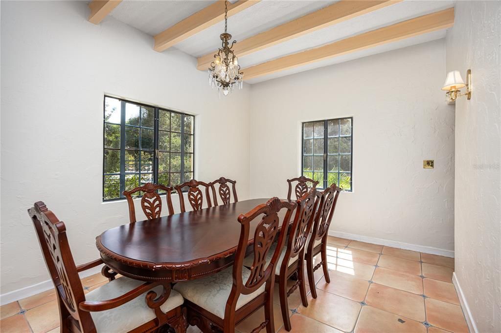 Dining Room with period lighting, beams and plaster walls