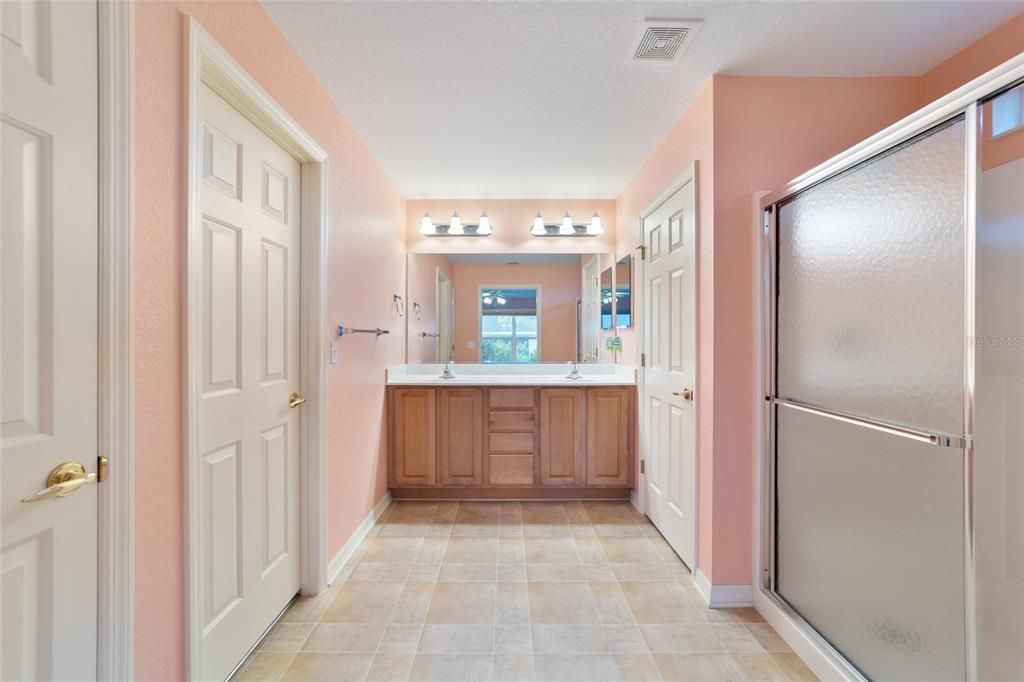 Dual sinks, walk-in closet and private toilet.