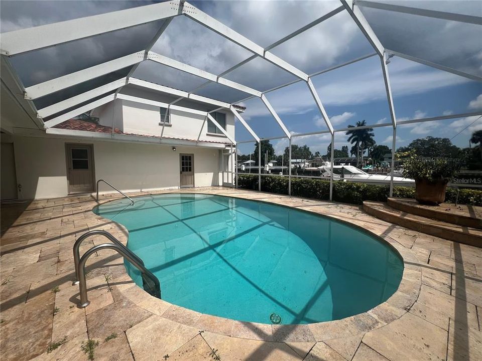 Heated Salt-water pool, fully screened in with access to full bathroom and backyard, and private deck!