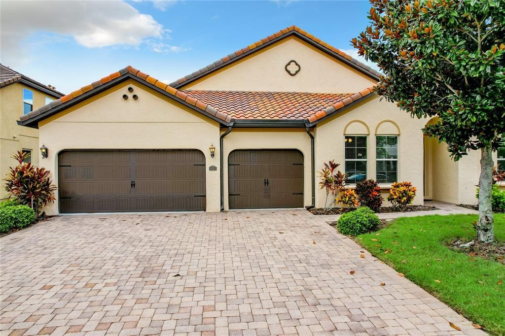 Three-car garage provides ample driveway