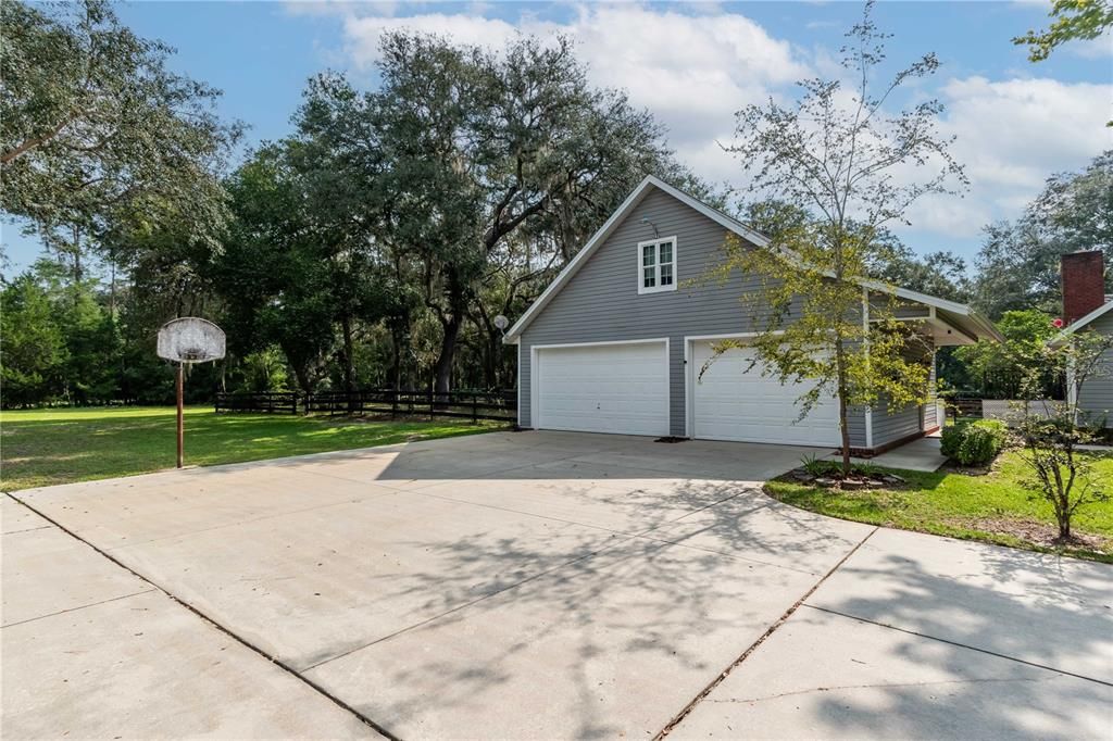 detached 3 car garage with an upstairs bonus room