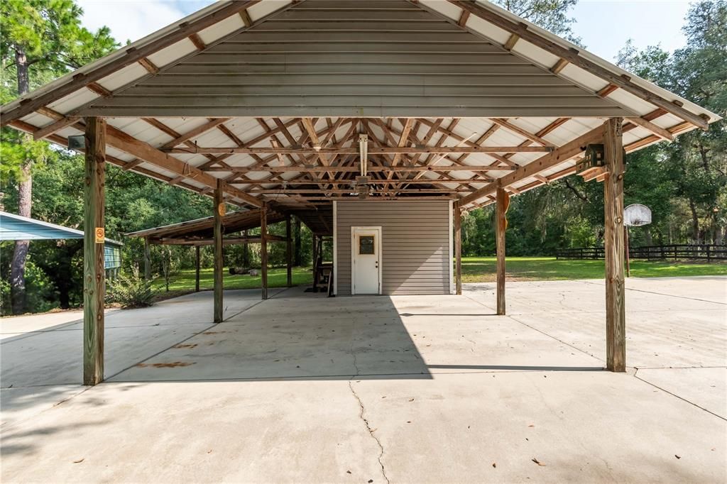 pole barn with run-ins & electric/water, feed/tack room & wash racks