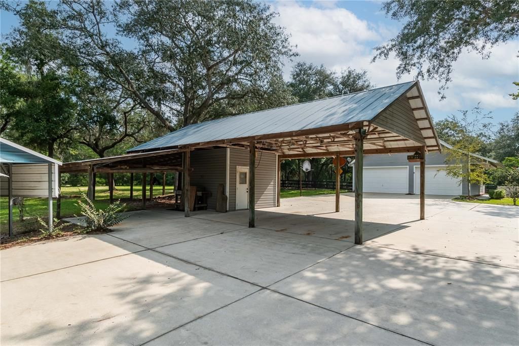 pole barn with run-ins & electric/water, feed/tack room & wash racks