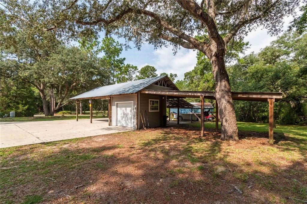 pole barn with run-ins & electric/water, feed/tack room & wash racks