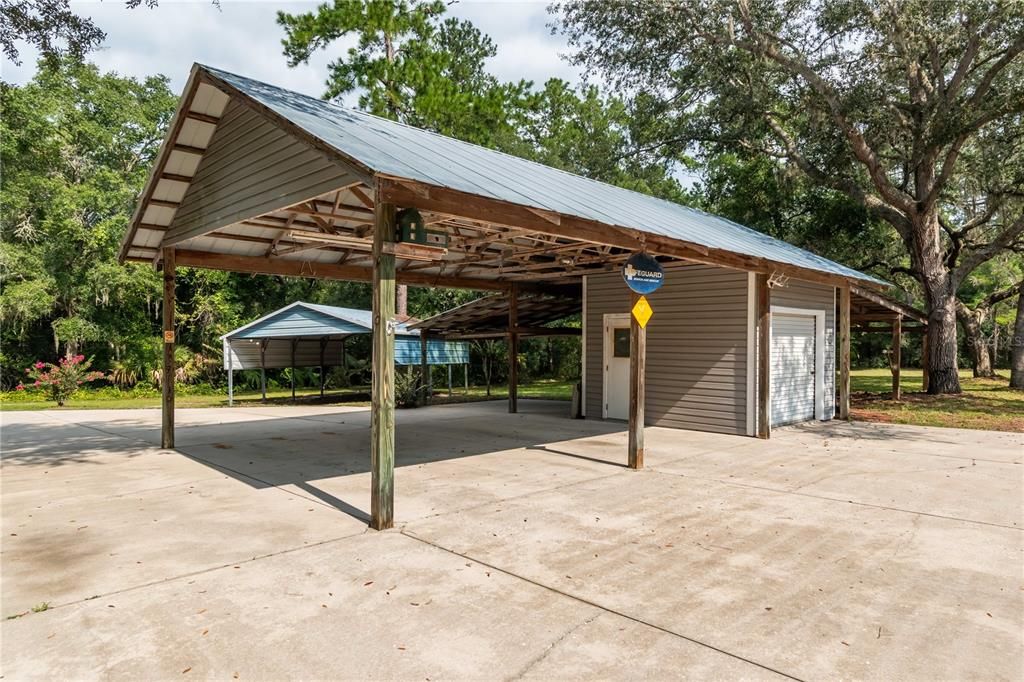 pole barn with run-ins & electric/water, feed/tack room & wash racks