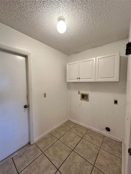 Laundry Room into 2 car Garage