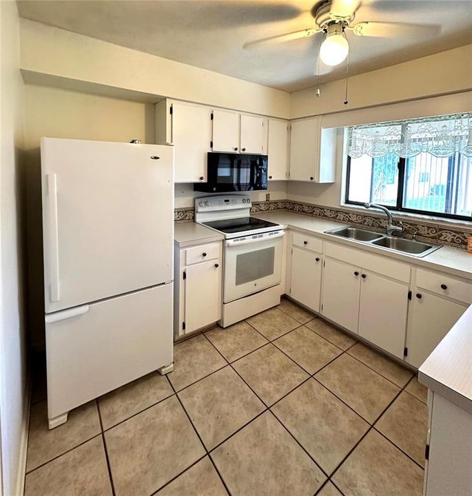 U-Shaped White Kitchen