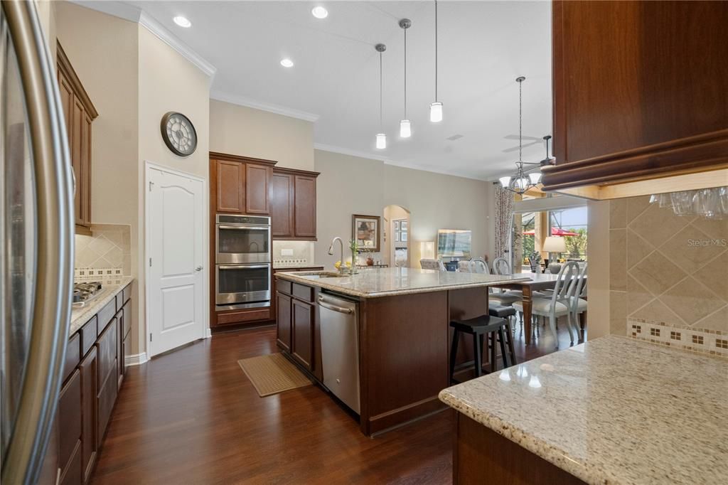 Kitchen includes a double oven and built in wine rack