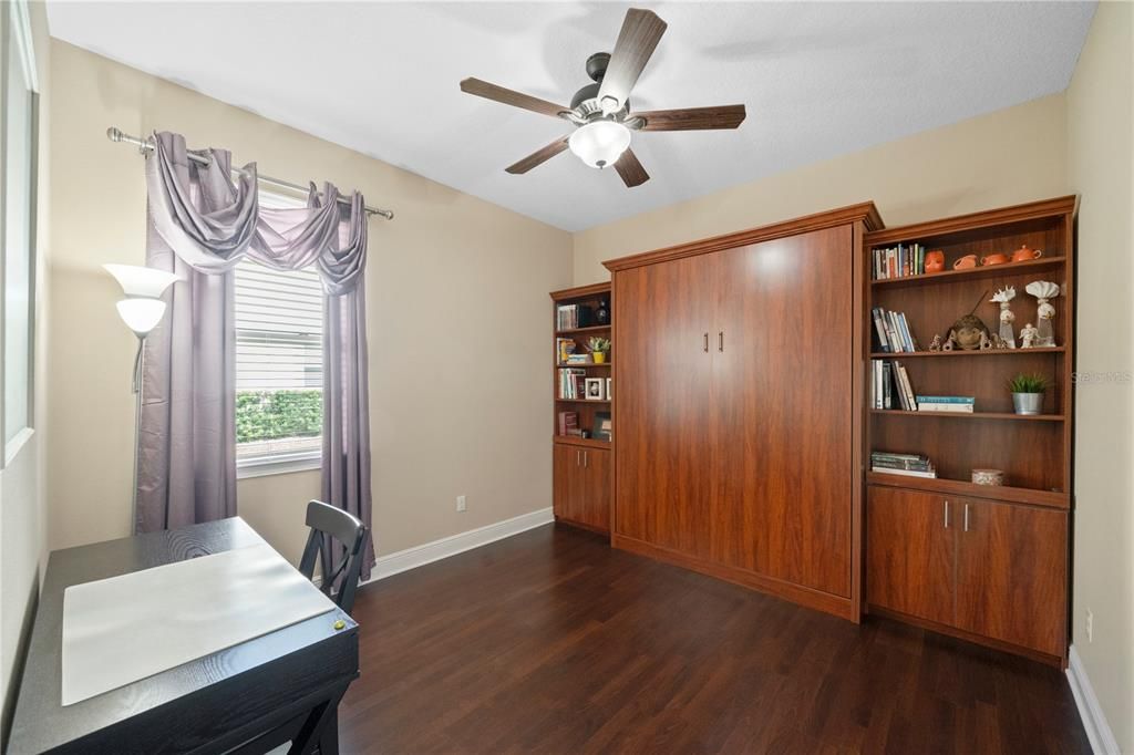 Bedroom 2 features a built in murphy bed, perfect for guests