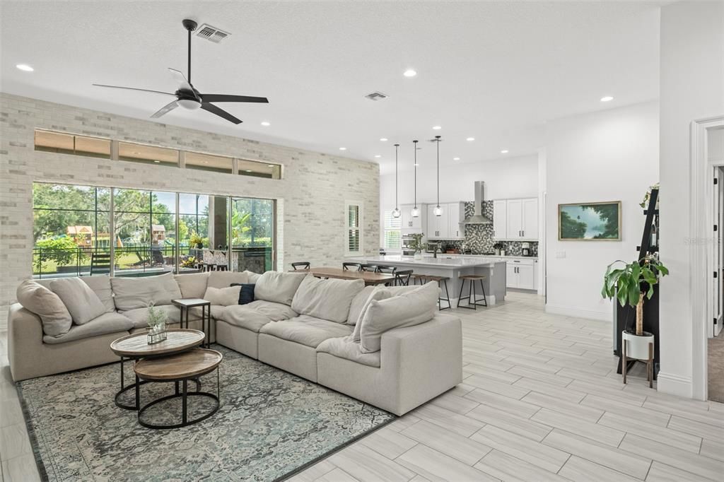 Spacious living room overlooking the pool.