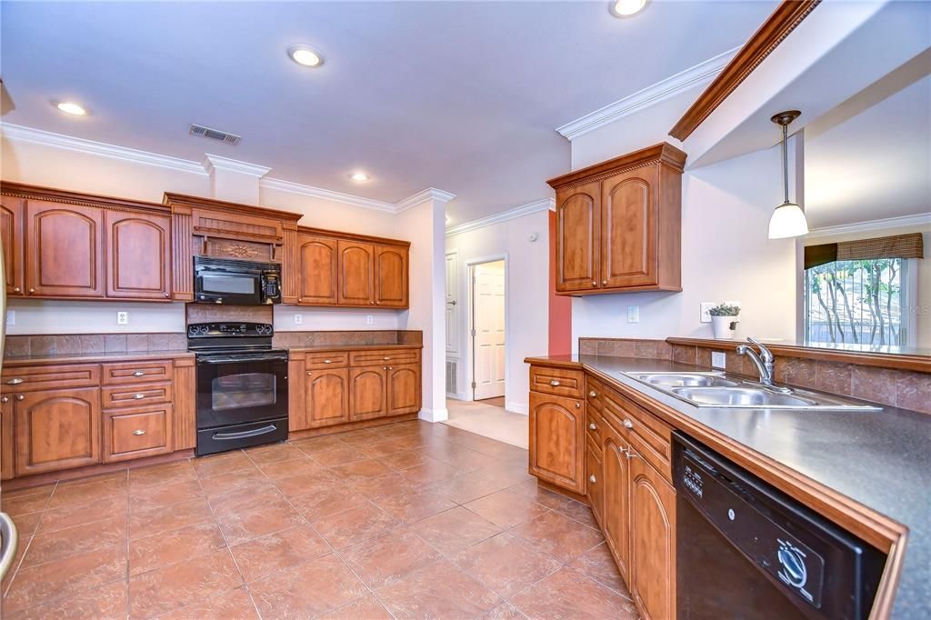 beautiful cabinets topped with rope crown molding!