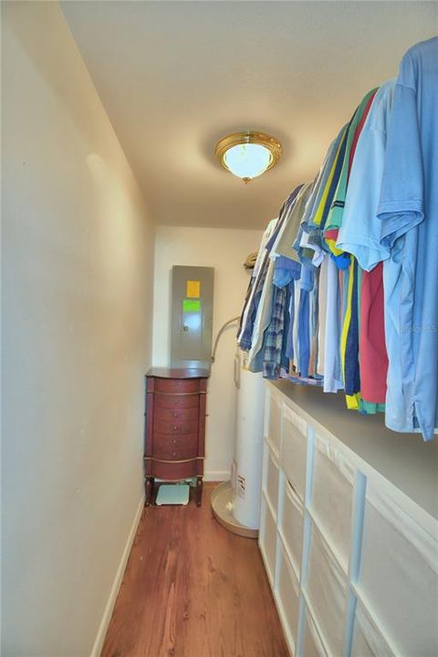 Walk-in closet in the primary bedroom.