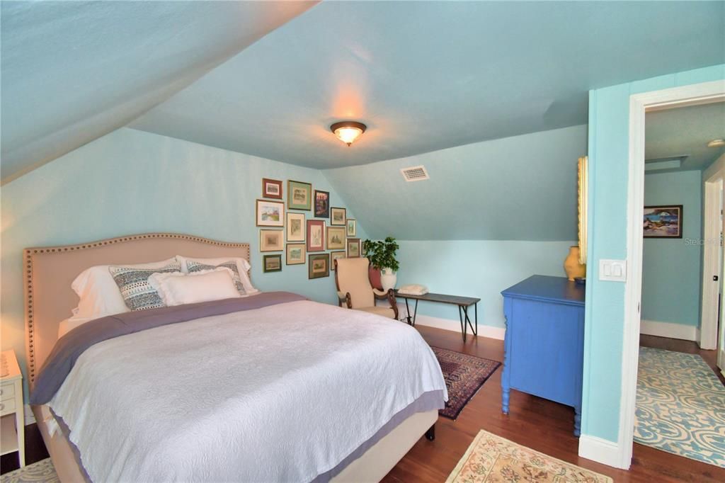 Bedroom 3, the slanted roof  akes a nice little alcove for a writing desk or dresser.