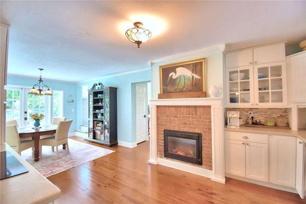 Kitchen with fireplace that backs up to the living room fireplace