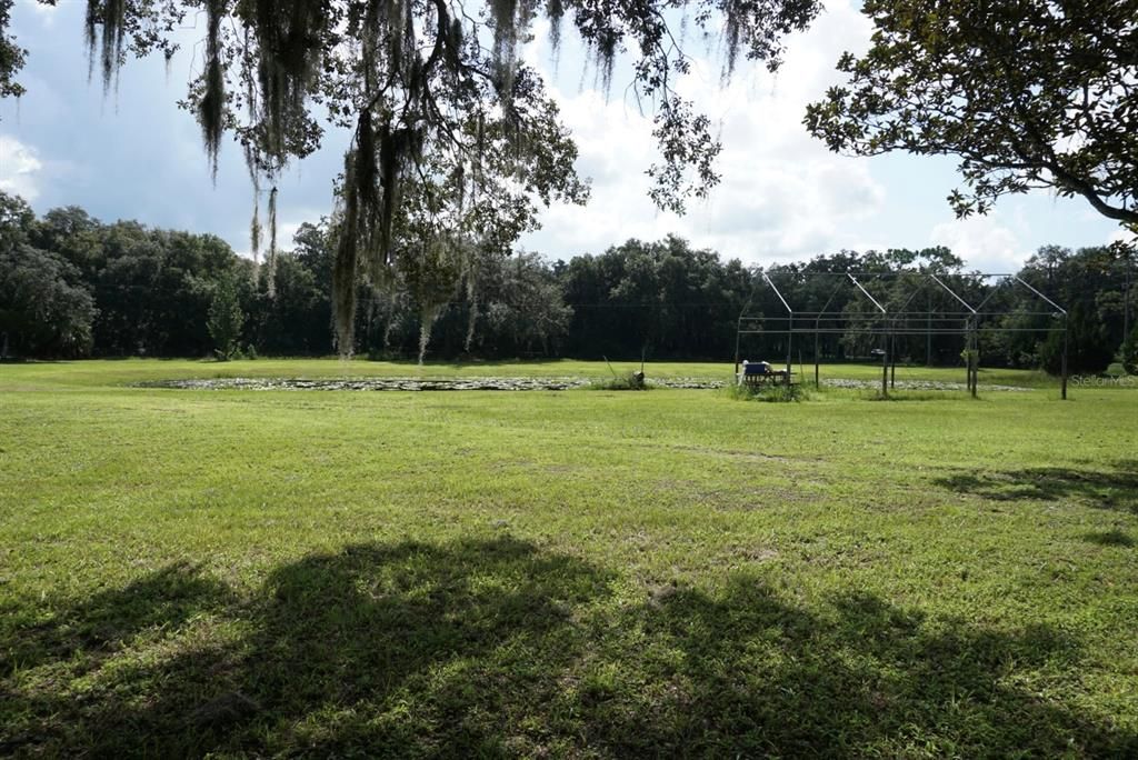 Pond view of property