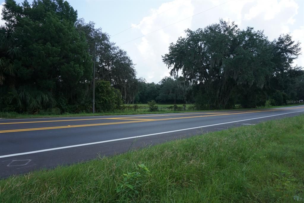 Road view of land next to property