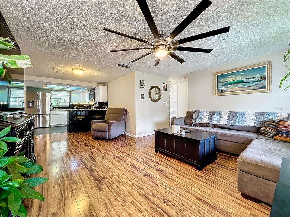 Another angle of the great room which looks into the breakfast bar and kitchen.